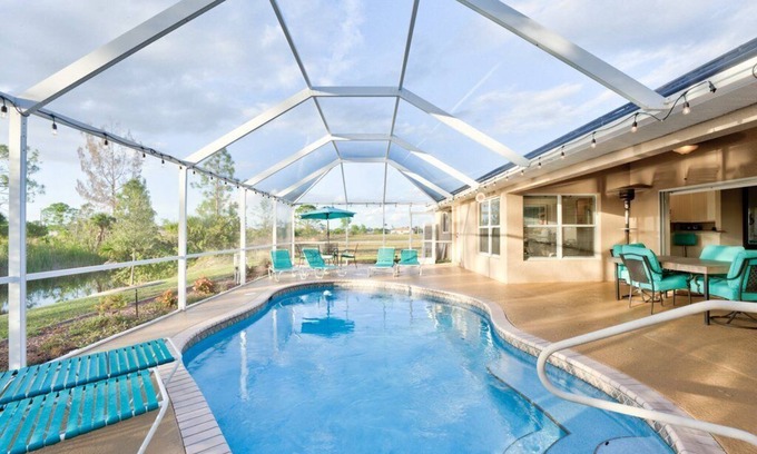 Jacarandas House | 4/2 Heated Pool Home Turquoise Anchor Sleeps 10 Near Downtown Ft. Myers