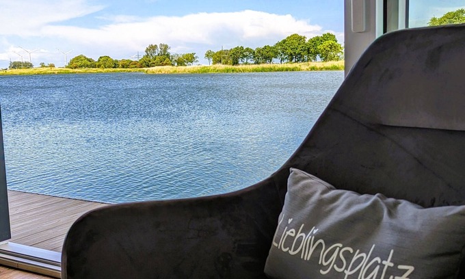 Wangerland Boat Rental | 45 m² houseboat with 40 m² roof terrace, modern furnishings. See photos!