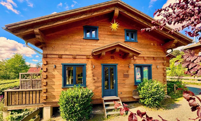 Hahnenklee House | 5 * log cabins with sauna, fireplace, terrace, barbecue etc. in alpine chalet style