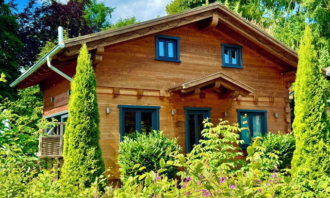 Hahnenklee Ski Chalet | 5 * log cabins with sauna, fireplace, terrace, barbecue etc. in alpine chalet style