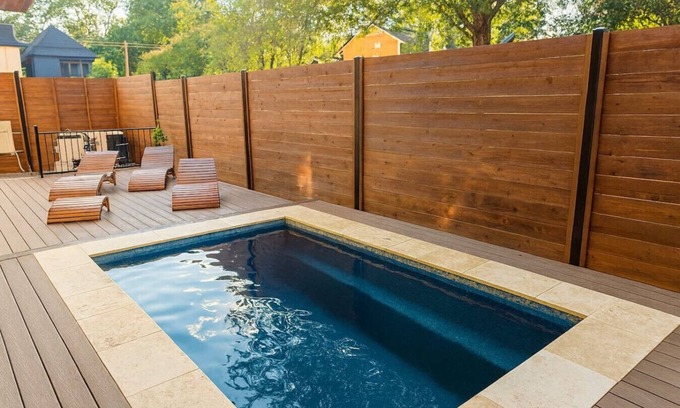 East Cesar Chavez House | 6BR 5BA Luxury Downtown Oasis | 2 Pools + Hot Tub