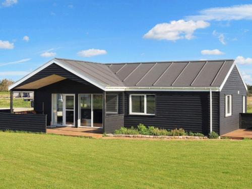 Grønhøj House | 8 person holiday home in Løkken-By Traum