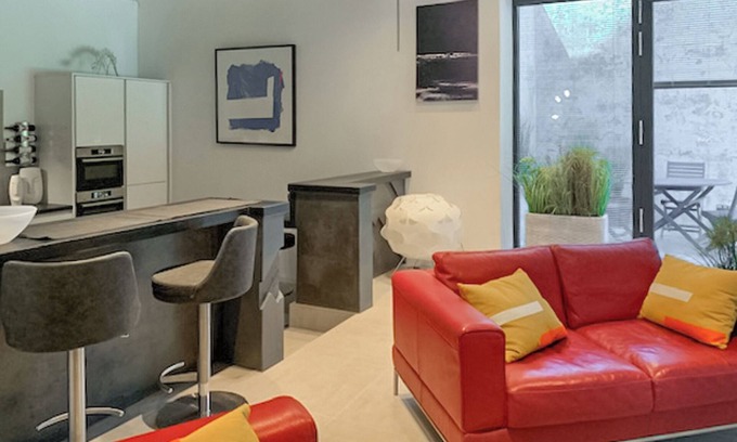 Tan-y-groes Apartment | A concrete themed one bedroom apartment.