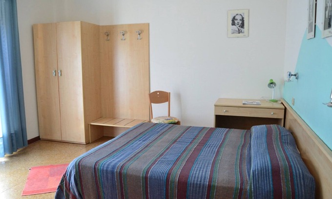 Lido di Jesolo Bed & Breakfast | A double bed room in a family managed guest house