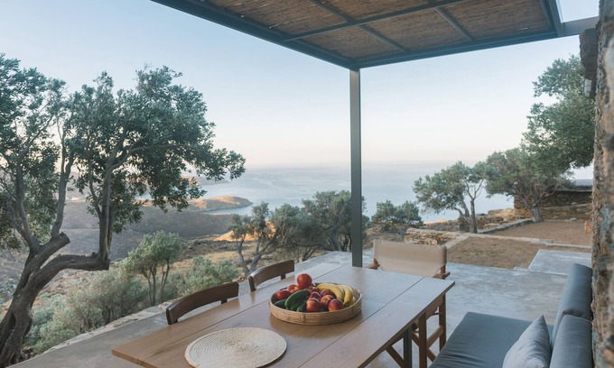 Exomvourgo House | A house in an olive grove with a unique view to the Aegean sea.