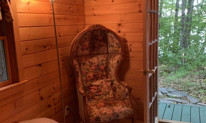 Belgrade Cabin | a relaxing guest house in the woods on a Lake