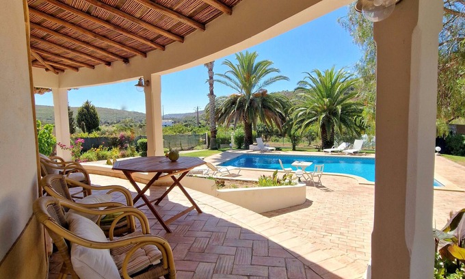 Bensafrim Villa | A south-facing, Mediterranean-style villa on 2 levels, walled and gated in a tranquil country setting, yet only 10 minutes from the popular historic, seafront city of Lagos in the Western Algarve