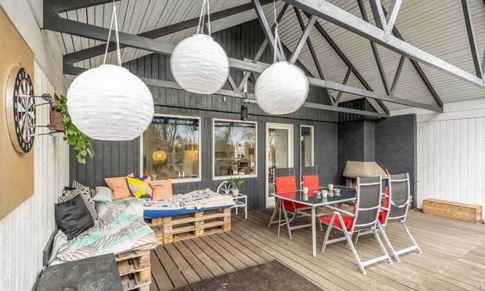 Hojslev House | A stylishly decorated cottage with a cozy ambience.