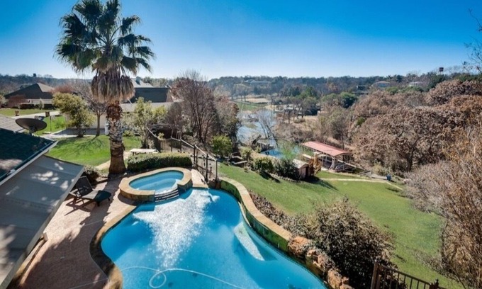 Fort Worth House | A summer boat dock & a pool
