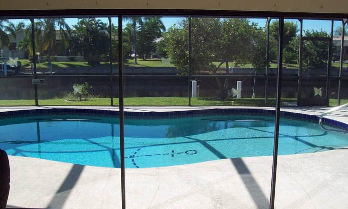 Punta Gorda House | Affordable luxury pool home on deep water canal.