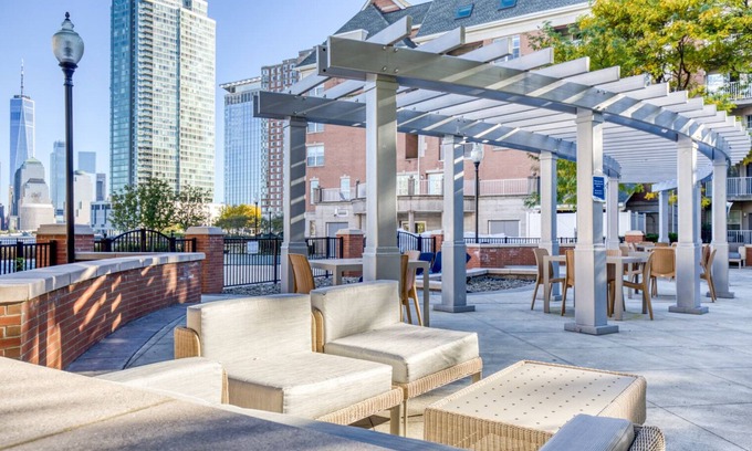 Exchange Place North Apartment | Airy Jersey City 1BR w/Gym, W/D & Elevator, near PATH, by Blueground