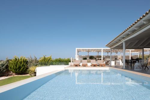 Agkisaras Villa | Alba Bianca Villa, Family Retreat with Heated Pool By ThinkVilla