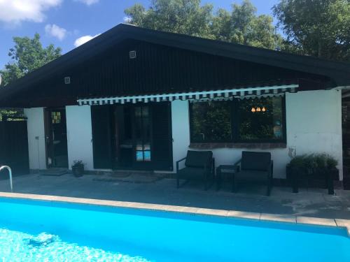 Nykobing Sjaelland House | Amazing Home In Nykøbinbg Sjælland With 3 Bedrooms, Swimming Pool And Wifi