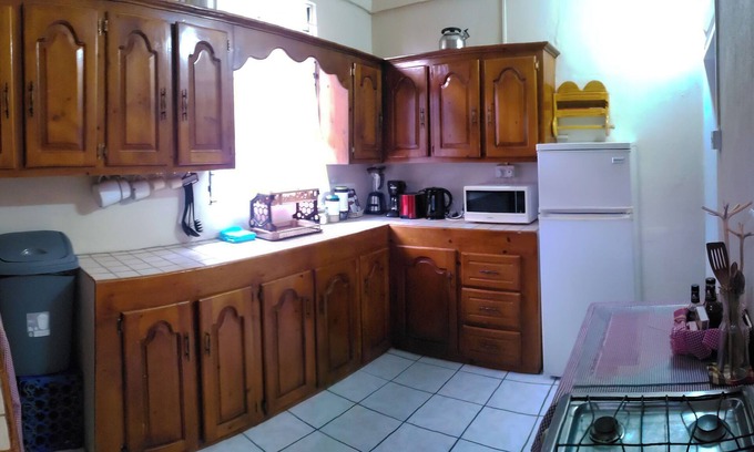 Soufriere Apartment | An authentic creole styled home ideal retreat for friends, family & partners.n