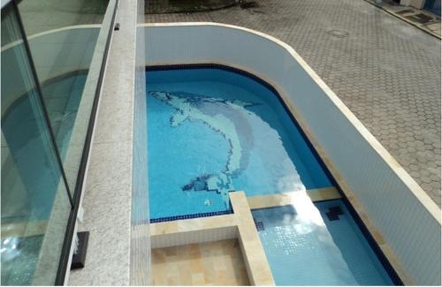 Praia Grande Apartment | Ap 43 churrasqueira e piscina - 100m do mar - Sirlei Ubatuba