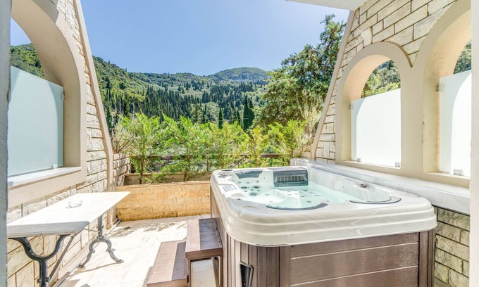 Agios Gordios Apartment | Apartment 'Doliva Anthi' with Private Whirlpool, Mountain View, Wi-Fi and Air Conditioning