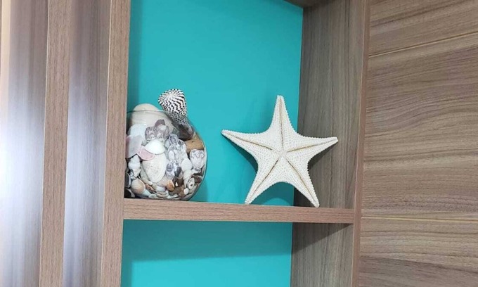 Umuarama Apartment | Apartment in the center of Ubatuba, view of the sea on the horizon