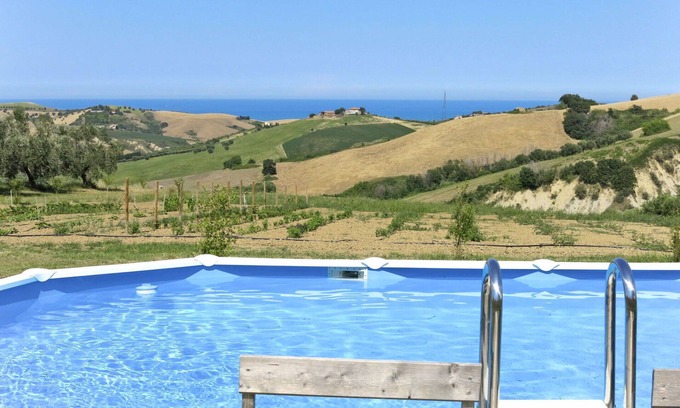 Cologna Spiaggia Villa | Apartment in villa with hot tub, WIFI, A/C, pool, TV, patio, pets allowed, panoramic view, parking