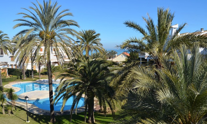 Almadrava Beach Apartment | Apartment on the sea with wifi, 2 bedrooms, 2 air conditioning, 2 pools, mountain and sea views