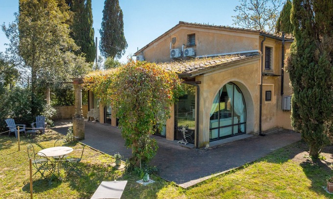 Montelopio Apartment | Apartment 'San Giovanni Residence 3 Beppa' with Private Garden, Wi-Fi and Air Conditioning
