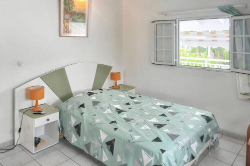 Damencourt Apartment | Appartement convivial au Moule avec jardin clôturé