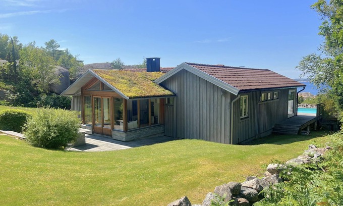 Hjaelteby Ski Chalet | Architect-designed villa with pool, sauna and sea view in Mjörn | SE09124