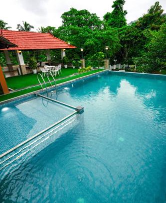 Athirapally Hotel | Athirappilly Rainland Resort