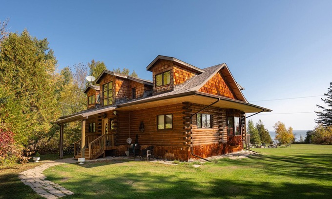 Traverse Bay Cottage | Authentic & Stunning, Rustic Log House located on 28 acres with private road