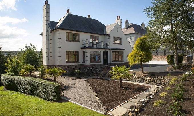Coleraine House | Award winning villa with River Views, Private Forest entrance and a Hot Tub.