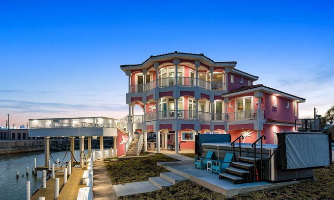Port Isabel House | Bayfront home with dock, private elevator, central AC & grill -snowbird-friendly