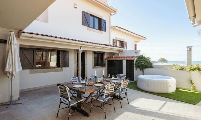 Vila Cha House | Beach Villa with Jacuzzi and Garage by HostWise
