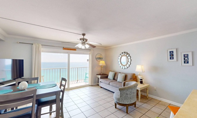Panama City Beach Condo | Beachfront condo with a kitchen, located in a gated resort featuring pools, hot tub, and a tiki bar!