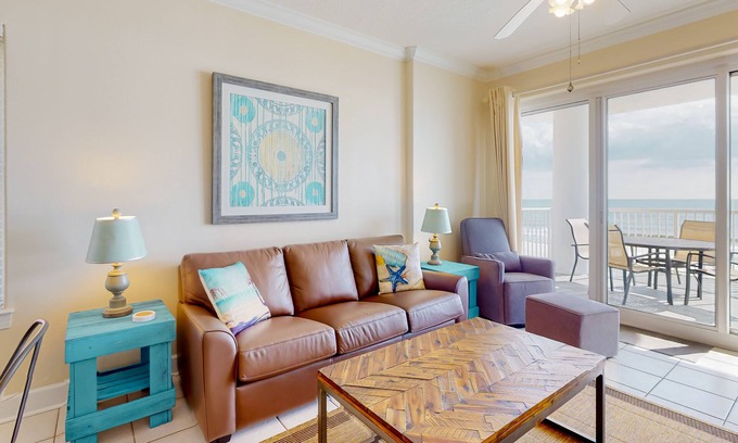 Gulf Shores Condo | Beachfront corner condo with amazing Gulf views, balcony, pools & hot tubs