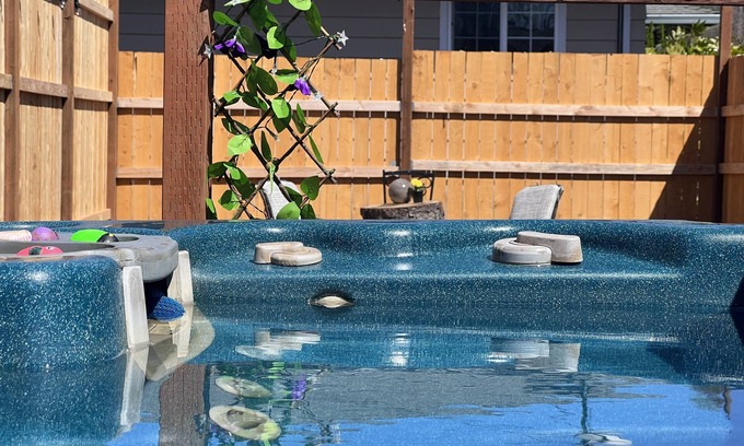 Hillsboro House | Beautiful bungalow with fenced patio space and private hotub