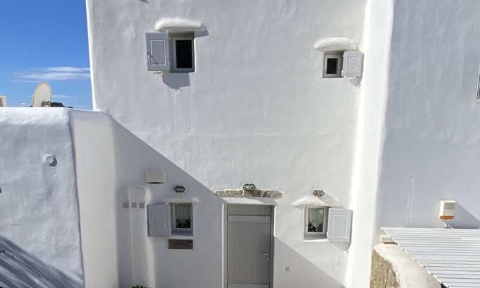 Psarou Villa | Beautiful Cycladic style house overlooking the sea