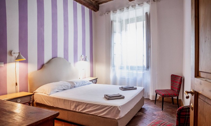 Scansano Bed & Breakfast | Bed and Breakfast 'Palazzo Ghio' with Wi-Fi and Air Conditioning