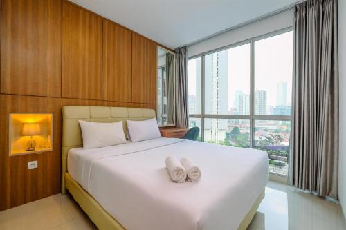 Semanggi Apartment | Best Homey and Nice 1BR at Ciputra World 2 Apartment By Travelio
