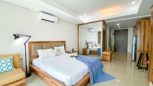 Bangka Apartment | Big and Comfy Studio at Kemang Village Apartment By Travelio