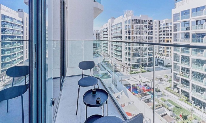 Nad Al Sheba Apartment | bnbme | Modern Apt with Pool & Gym | 12 min to Downtown