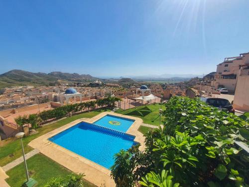 Los Geraeos Apartment | Bonito apartamento con terraza, piscina y vistas - by Aloha Palma