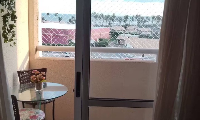 Barra dos Coqueiros Apartment | Apartment right on the sand with sea view!