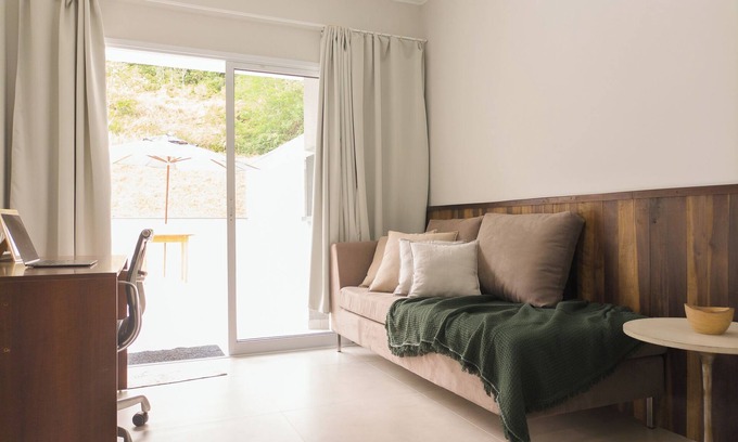 Rocio Pequeno Apartment | Apartment with terrace in the central region of São Francisco do Sul