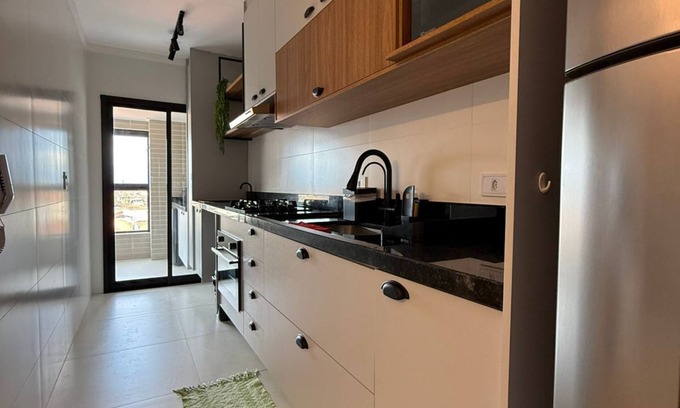 Praia Grande Apartment | Brand new apartment right on the sand with sea view.