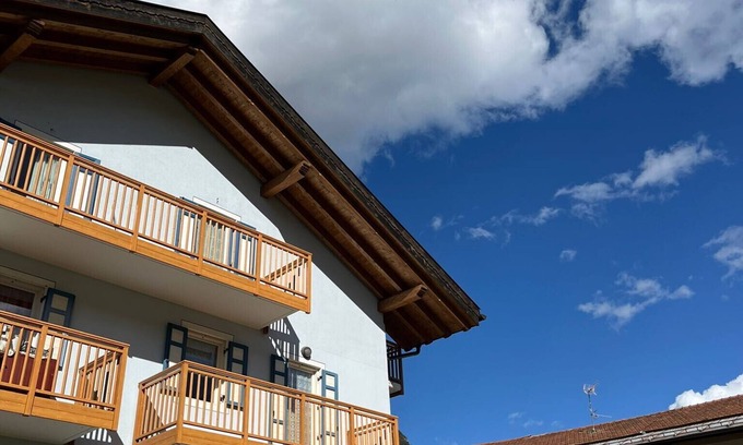 Ziano di Fiemme Apartment | Bright and comfortable apartment with mountain views.