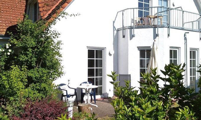 Zingst Apartment | Bright, friendly first floor apartment with terrace and access to the garden