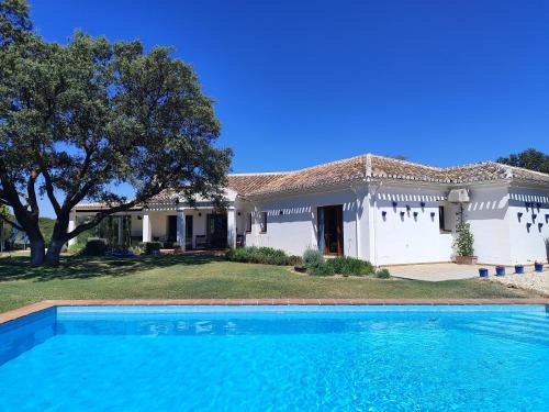 Villanueva del Rosario House | Buddha-Can