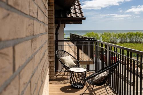 Rewa Apartment | Bursztynowy Widok - apartament z bezpośrednim dostępem do plaży oraz widokiem na morze