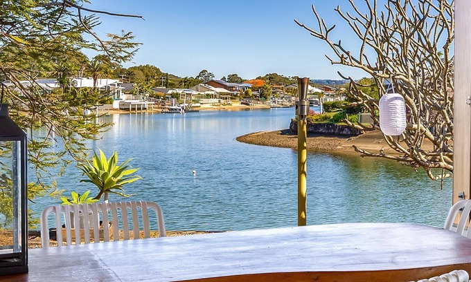 Maroochydore House | Canal Front family Home with expensive undercover outdoor area and pool
