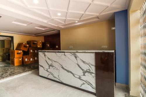 Yelahanka Hotel | Capital O N R Residency