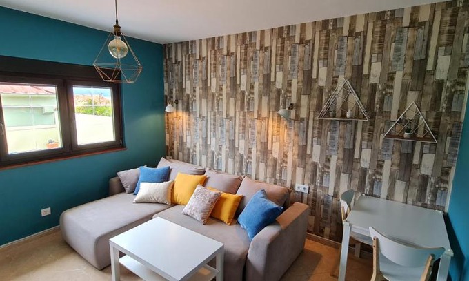 Fisterra House | CASA CAXOTA: Planta baja con terraza y vistas al mar